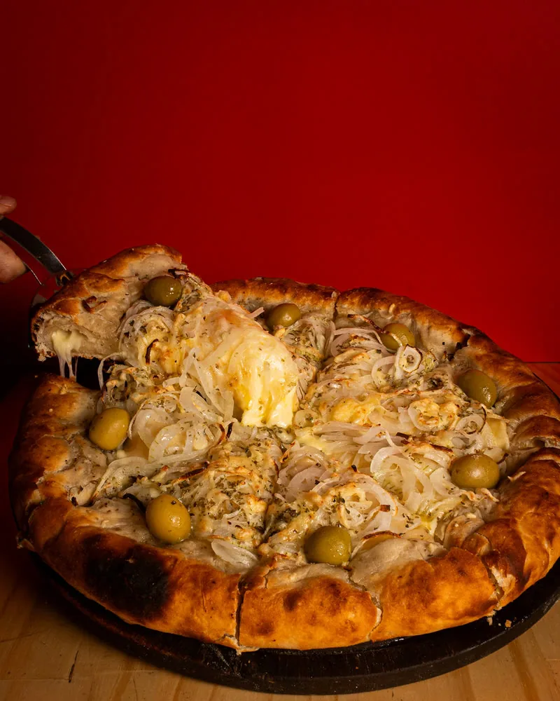 Pizza Muzza Madre con queso derretido